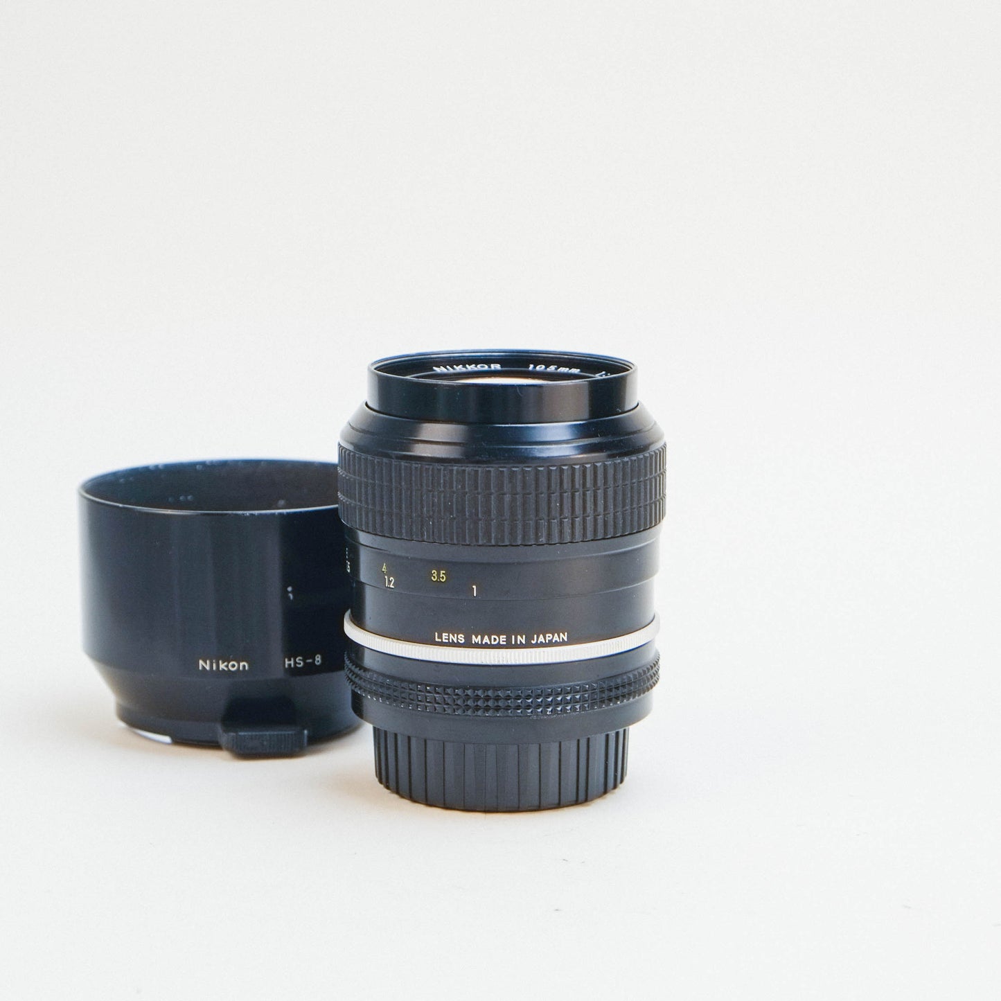 Nikon 105mm f2.5 pre-AI /w HS-8 lens hood